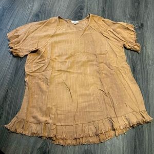 Boutique brown top with frayed sleeves and bottom soft material